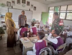 Bhabinkamtibmas dan Bhabinsa Kawal Launching Perdana Program Makan Bergizi Gratis di SDN 012 Gunung Kelua Samarinda.
