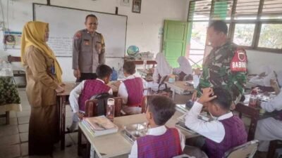 Bhabinkamtibmas dan Bhabinsa Kawal Launching Perdana Program Makan Bergizi Gratis di SDN 012 Gunung Kelua Samarinda.